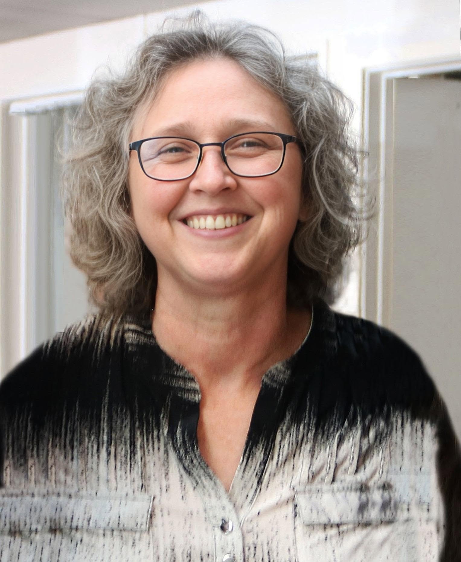 Portrait of Ginger Pickett, owner of P & L Recovery